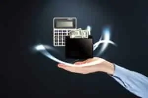 Picture Of Hand manual premium With Calculator And Money
